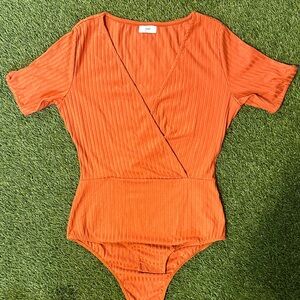 YSE Woman’s Vibrant Orange Bodysuit